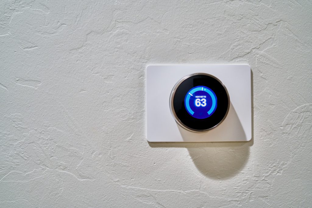 Nest thermostat on a wall